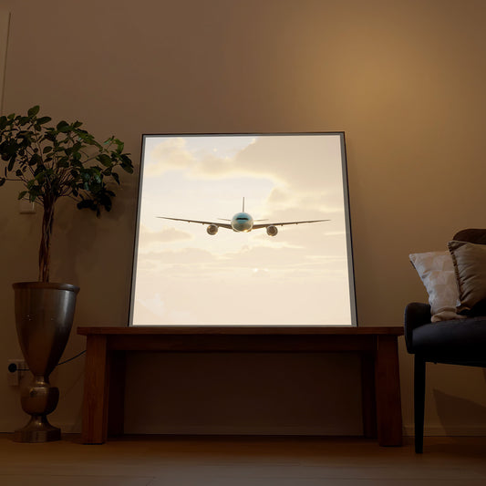 Gerahmtes LED-Bild mit Airbus A350 im Flug, Flugzeug von vorn über Wolken, schwarzer Rahmen