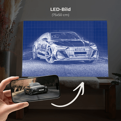 Gerahmtes Auto-Wandbild mit blauer Bauplan-Illustration; Handy zeigt Sportwagen-Foto