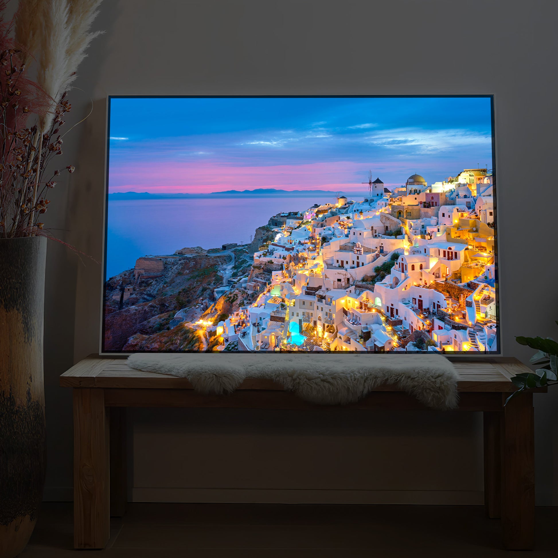 LED-Bild „Santorini bei Nacht“ mit warm beleuchtetem Küstenort, rechteckiger Rahmen