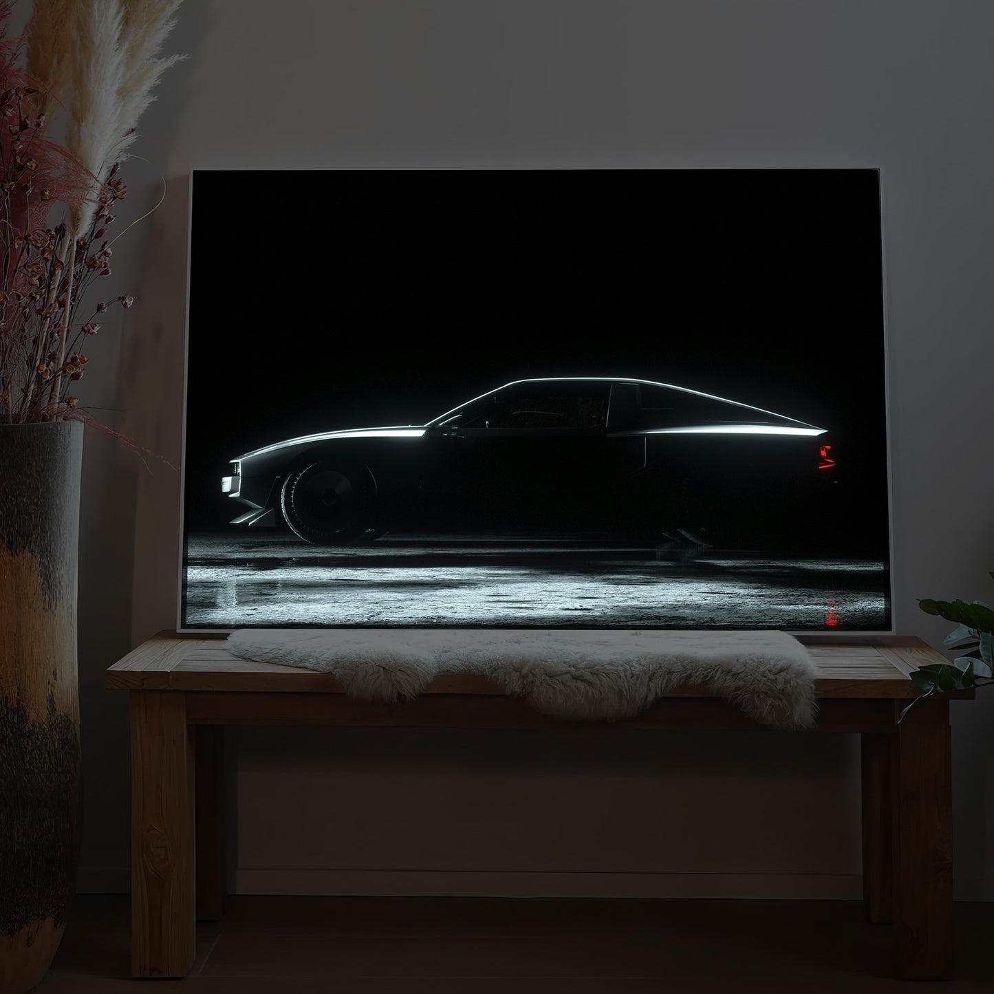 LED-Bild mit leuchtender Retro-Autokontur auf dunklem Hintergrund