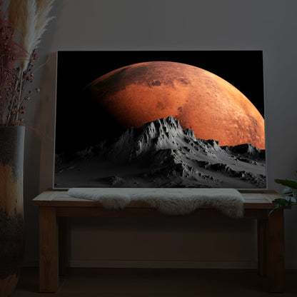 Rechteckiges LED-Bild mit Mondmotiv über Berglandschaft, in dunklem Rahmen