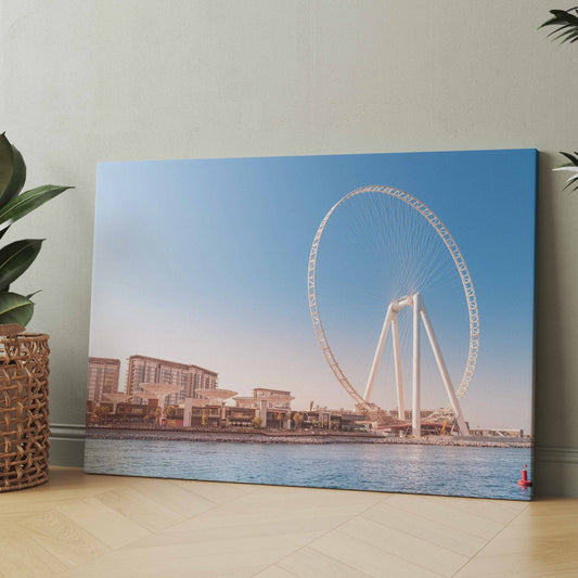Poster mit Riesenrad am Wasser, blauem Himmel und Ufergebäuden