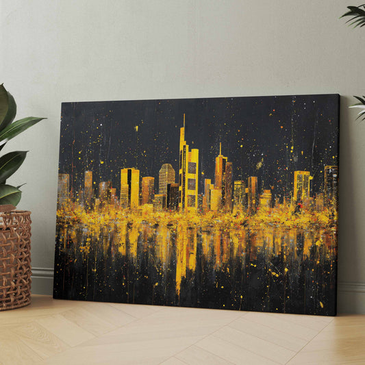 Leinwand mit Frankfurter Skyline in Gold auf dunklem Grund, mit Spiegelung im Wasser.